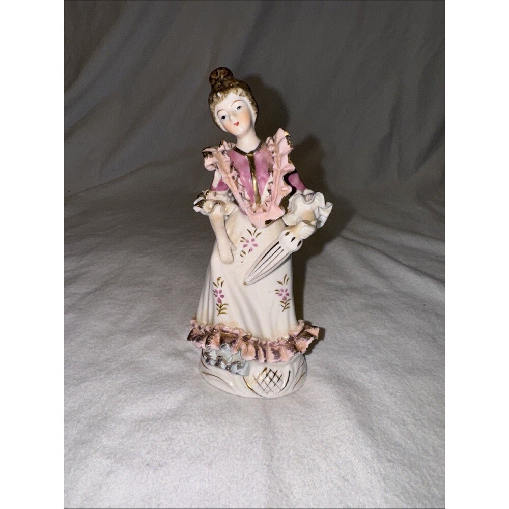 Porcelain Lady Figurine 6.25 Inches Tall. Made By Chase. Bone China